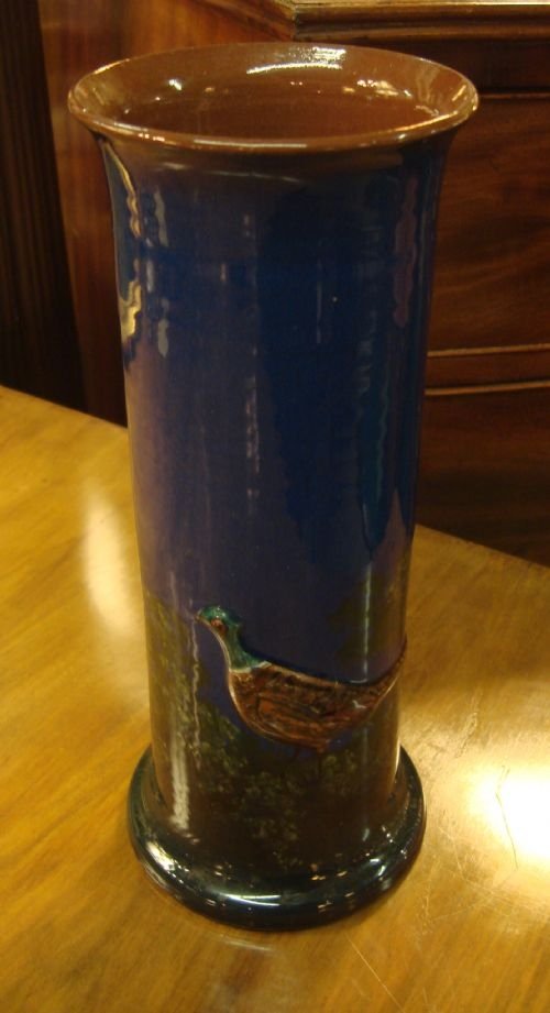 circa 1900 english west country tall glazed pottery vase with game bird relief design in very good condition