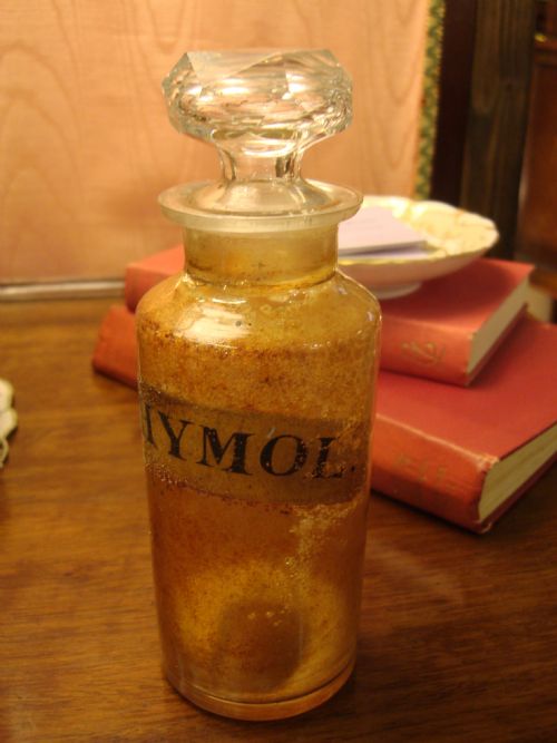 19th century apothecary jar with painted label