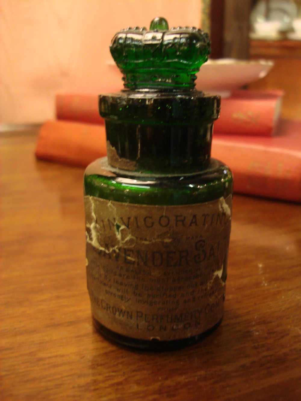 crown perfumery green glass crown topped bottle of lavender smelling salts